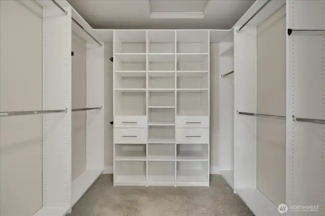 Walk in closet well organized.