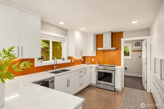 This kitchen is fantastic, sleek, warm and fresh. It has all the bells and whistles plus more storage than you could imagine!