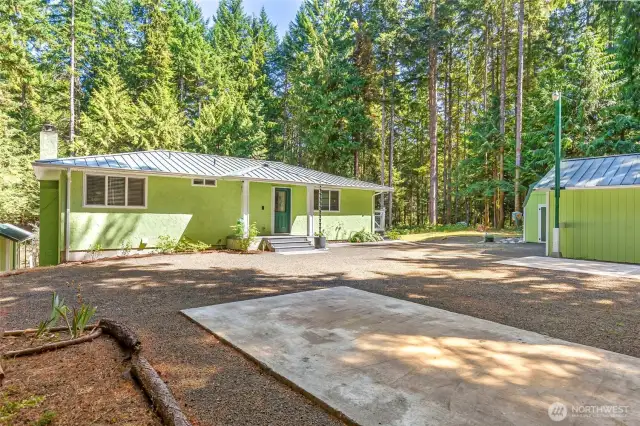 Enjoy the detached garage and shop area.