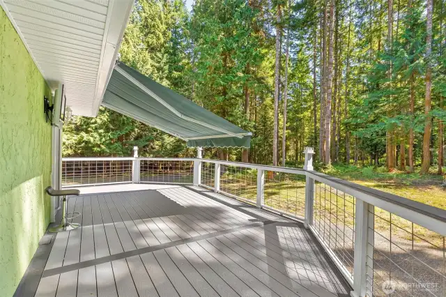 Lovely deck area with TV... great for those fall football games and  and easy access to the kitchen!