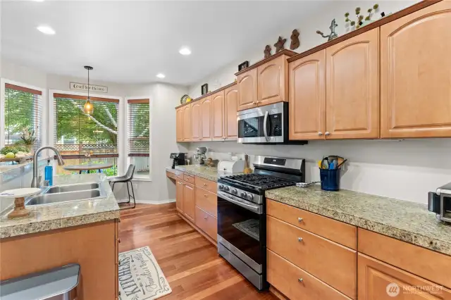 Open Concept Kitchen with Newer Stainless Steel Appliances