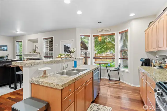 Open Concept Kitchen with Newer Stainless Steel Appliances
