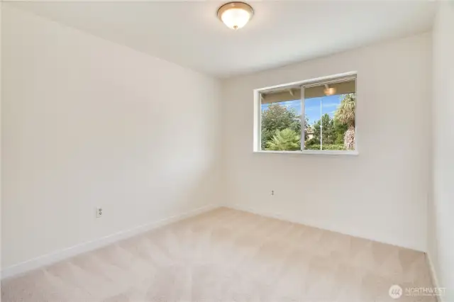 All three generously sized bedrooms are located on the second floor. This one faces the backyard for privacy!
