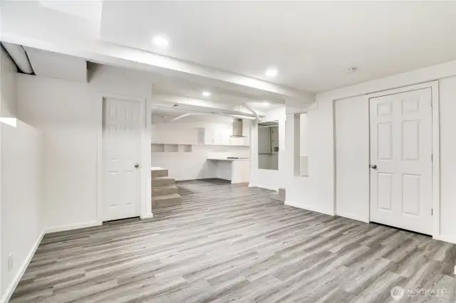 Add a murphy bed to this room and you have a great studio space! The recessed lighting helps this space feel bright and cozy.