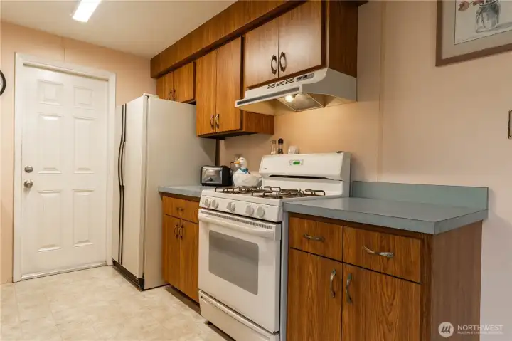 The closed door leads to the garage.