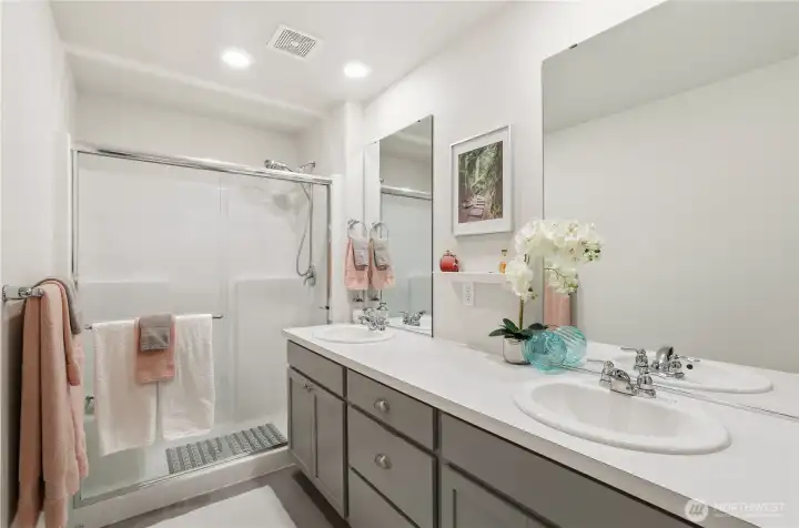 Primary Bathroom, Double sinks and large shower.