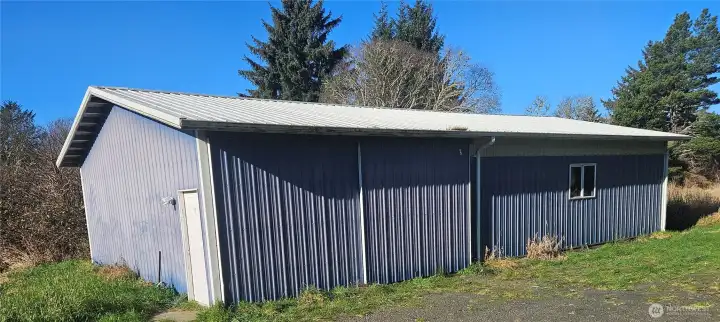 The West shop, located in line with the house and garage, is very spacious and currently rented.