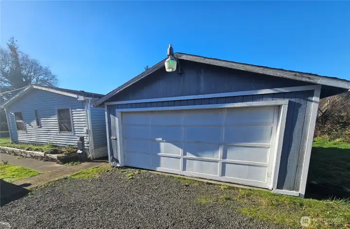 The double car detached garage is conveniently located close to the house.