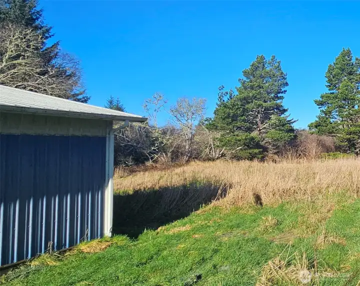 The second acre to the rear of the property is undeveloped waiting for all of your possibilities.