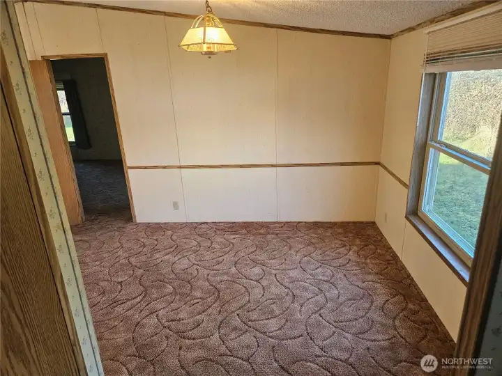 Conveniently located next to the kitchen is the dining area.