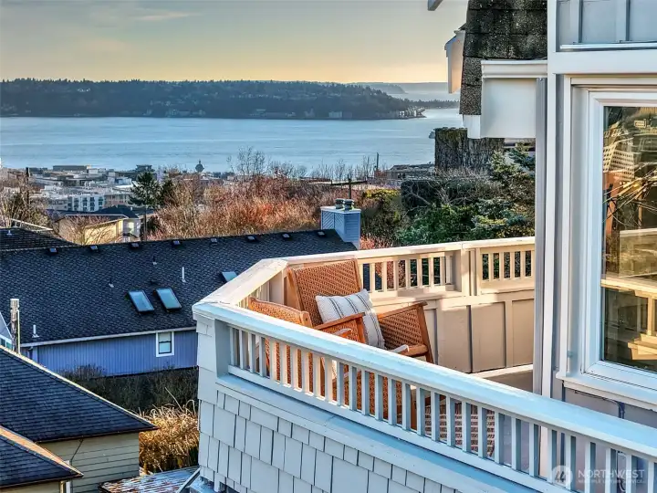 Great outdoor spaces include decks from living and primary suite, a low maintenance front yard and a ground level sunshine terrace.