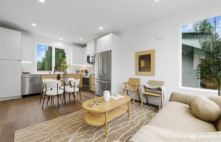 Expansive windows and engineered hardwoods are refreshing details.