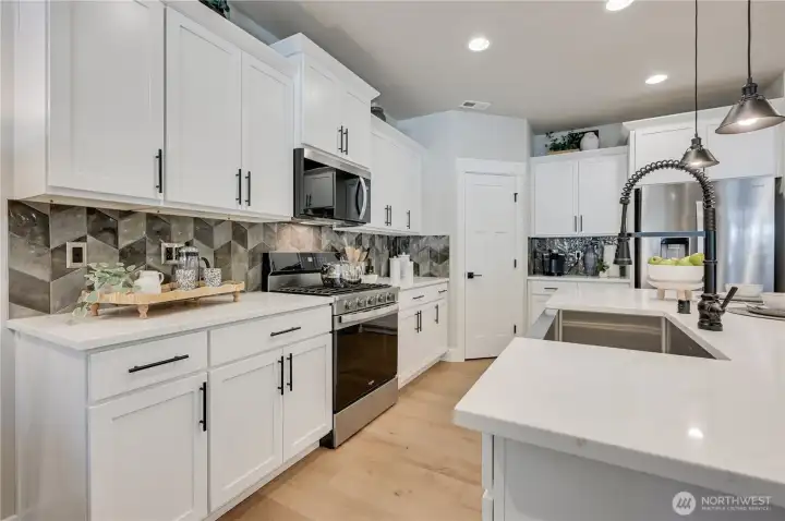 Photos of furnished model home on Lot 18 of same plan. No two homes are alike. Color selections and details will vary. Ask for details