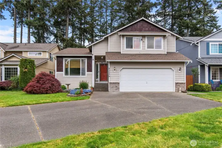 Front of home, extra long/ large driveway
