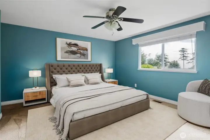 Primary bedroom with lush garden  views