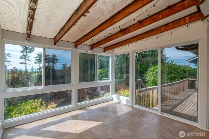 Sunroom for year round enjoyment -slider to access deck