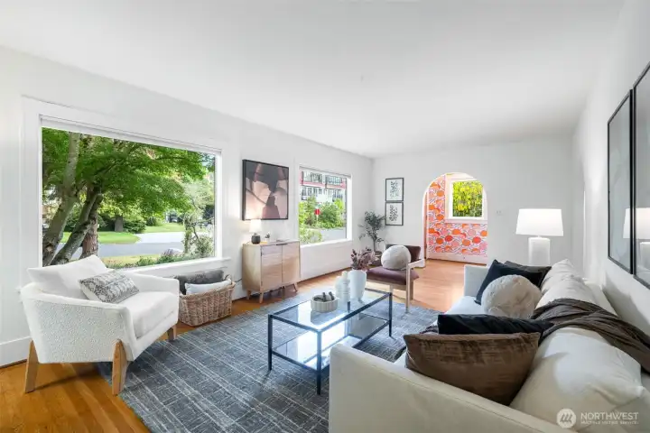 Huge windows invite the light throughout this spacious home. Huge windows invite the light throughout this spacious home.