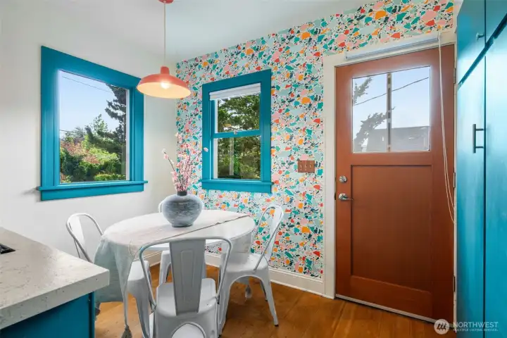 Sweet breakfast nook with door leading to deck over backyard. Sweet breakfast nook with door leading to deck over backyard.