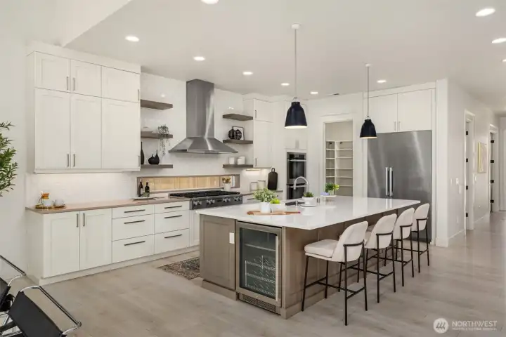 Another view of the stunning chef’s kitchen, thoughtfully designed for both everyday living and effortless entertaining.