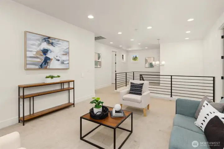 Versatile upper-level bonus room, ideal as a media room, playroom, or flexible living space.