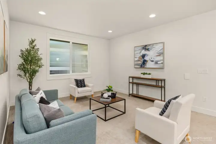Another view of the spacious second-floor bonus room, offering flexible space for a media room, and or playroom.