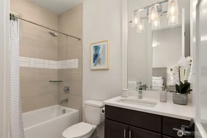 One of two second-floor full bathrooms, offering convenience and functionality.