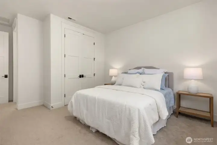 Spacious second-floor bedroom suite offering comfort and privacy.