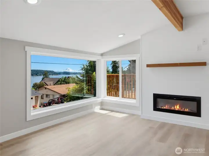 Mt. Rainier, water views with the ambiance of the fireplace. . . life is good!