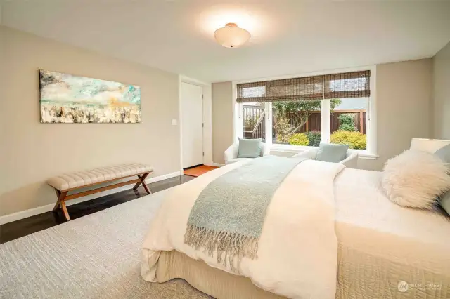 Lower level bedroom with garden views.