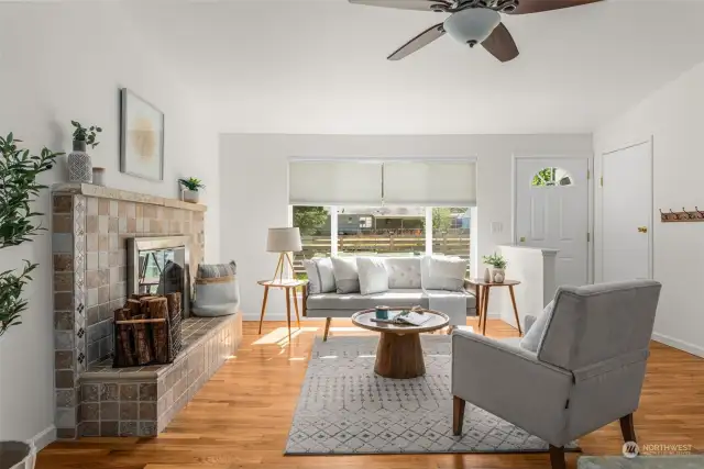 Enjoy a peaceful neighborhood from your new living room. Check out the original hardwood flooring.