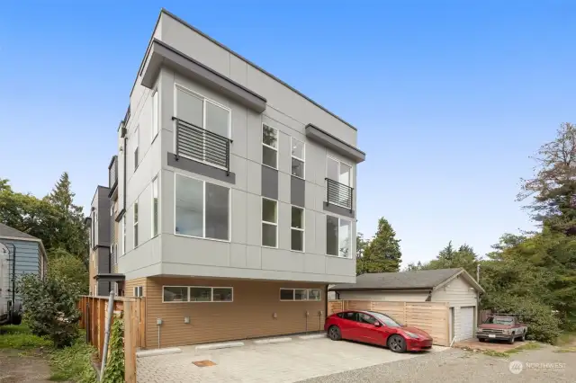 The sleek, modern exterior design highlights the cutting-edge architecture of this gorgeous home.
