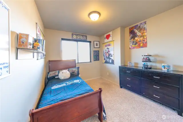 Another fantastic bedroom, bathed in sunlight and offering generous space