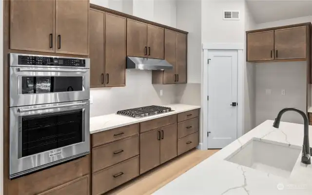 Kitchen with large island and plenty of storage.