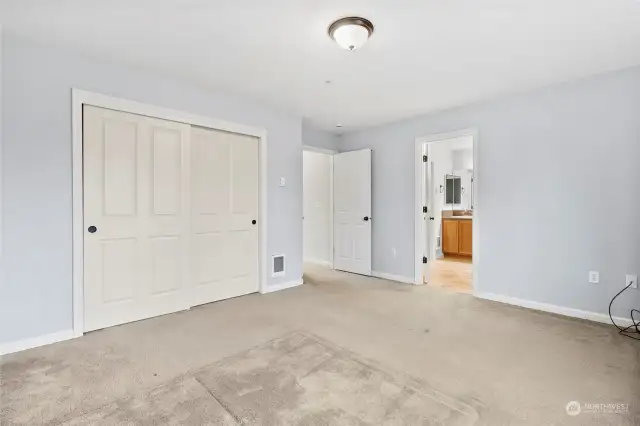 Primary bedroom with natural lighting