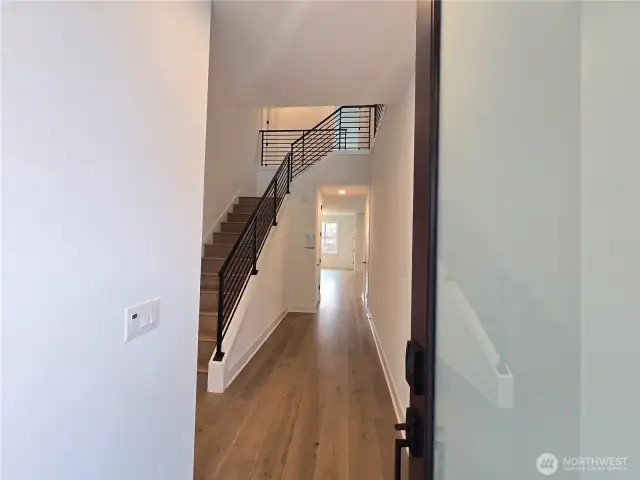 Two Story Open Entry with Extensive Metal, Open Railing