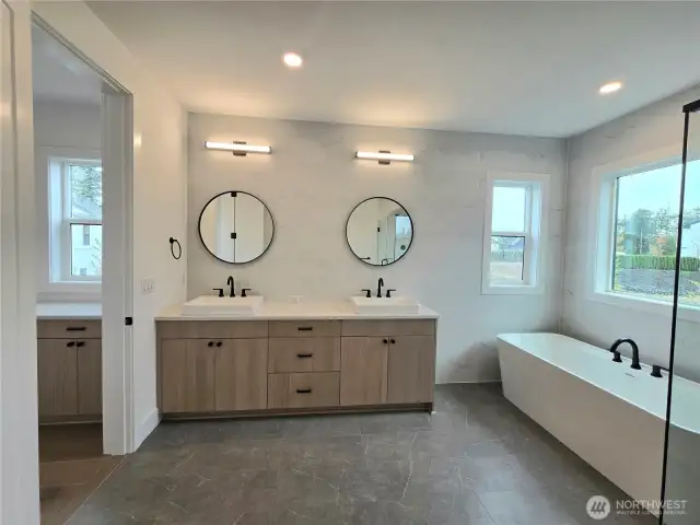 Double Vanity with Full Tile Wall and Designer Mirrors
