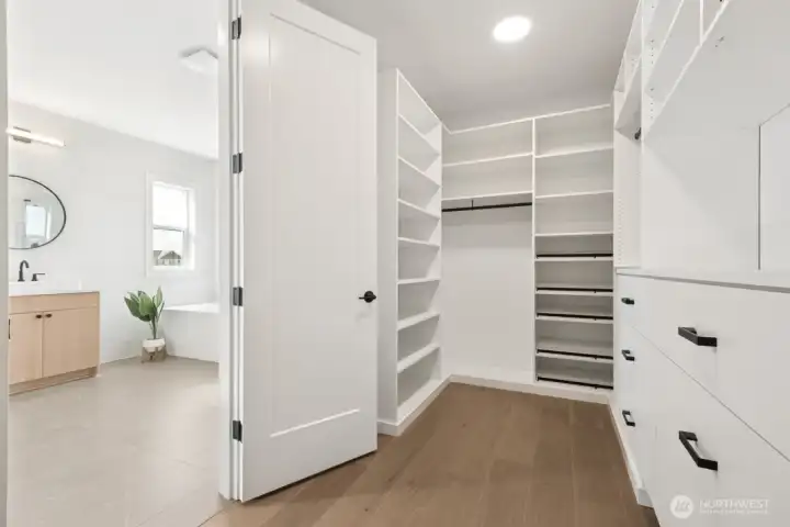 Primary Closet with custom built ins.