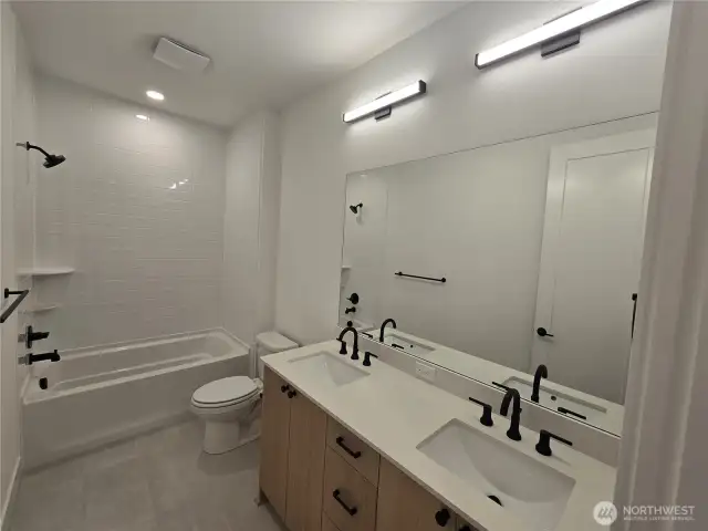 Hall Bathroom Upstairs Featuring Double Vanity