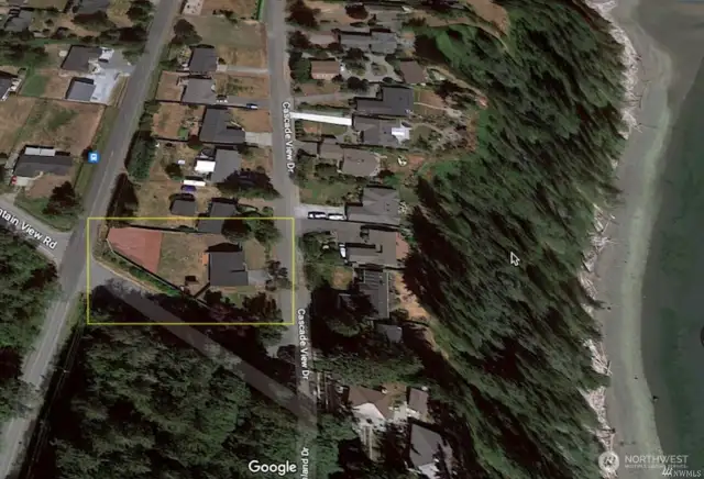 nearly half an acre across the street from waterfront.