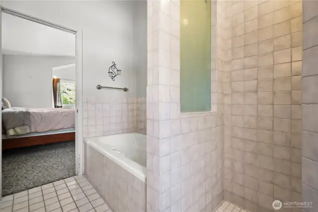 Oversized soaking tub with a stylish tile surround