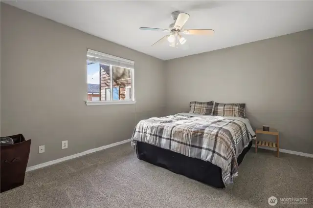Bedroom #1 located on the northwest corner of the main level with double closets and built in organizers.