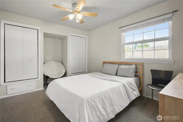Bedroom #2 situated on the mail level at the front, northeast corner of the home.