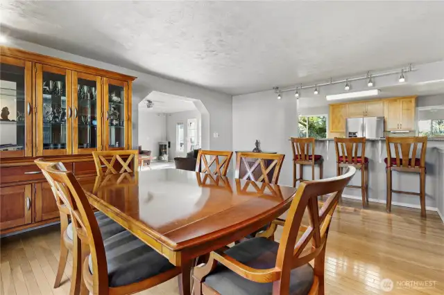 Generously sized dining room seamlessly flows into the open-concept kitchen, creating a warm and connected space for everyday living.