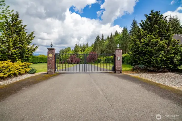 Access neighborhood via private gate by using access code or remote entry.