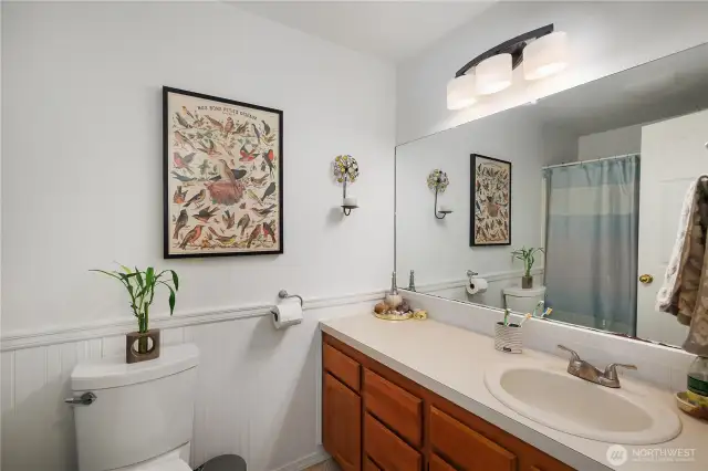 The full bathroom features a tub and shower and is a great size.