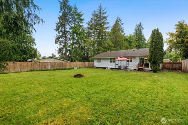 Nice, flat backyard with newer back steps-perfect for the weekend BBQs, playing with the dog or just kicking back enjoying the outdoors. The backyard is a real highlight-nice, flat, and super usable. It's the kind of yard that's easy to love.