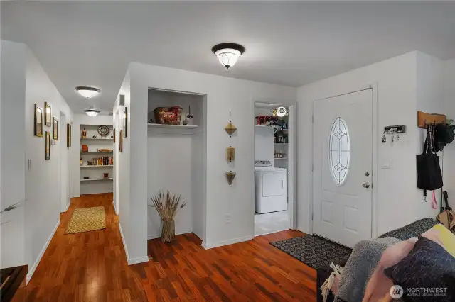 Right of the front door, you'll find a handy utility room that leads straight into the two-car garage--super convenient! There's also a coat closet.