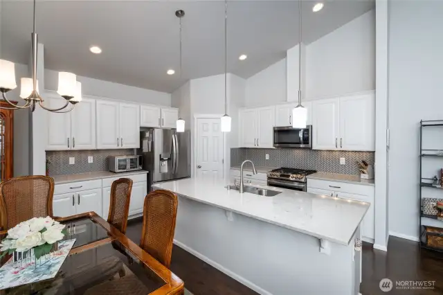 Upgraded tile backsplach and microwave.