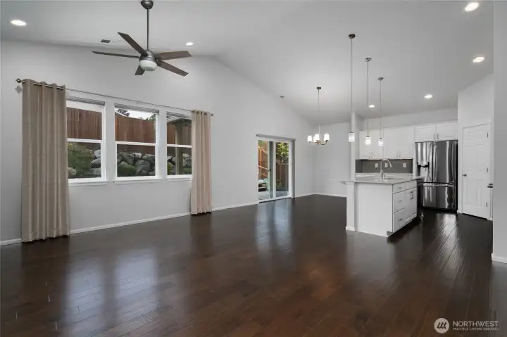 Livingroom adjoins kitchen and dining area.