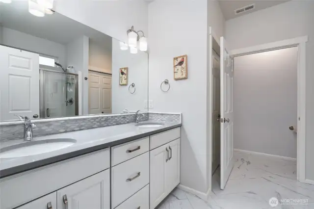 Primary bath with large walk in shower.